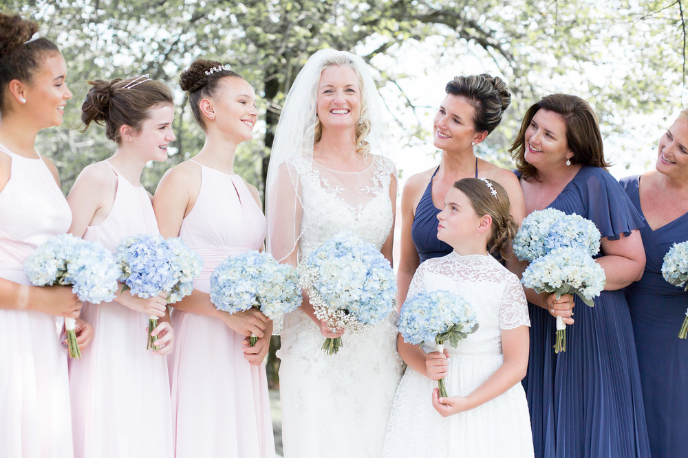  Kristin was surrounded by her gorgeous bridesmaids; her 3 sisters + 4 beautiful nieces!  